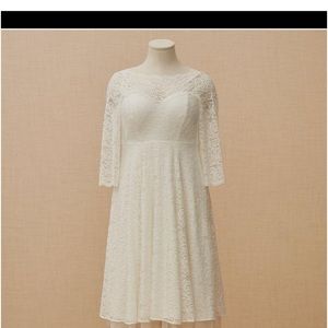 I am selling this beautiful white dress from Torrid.